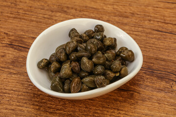 Tasty capers in the bowl