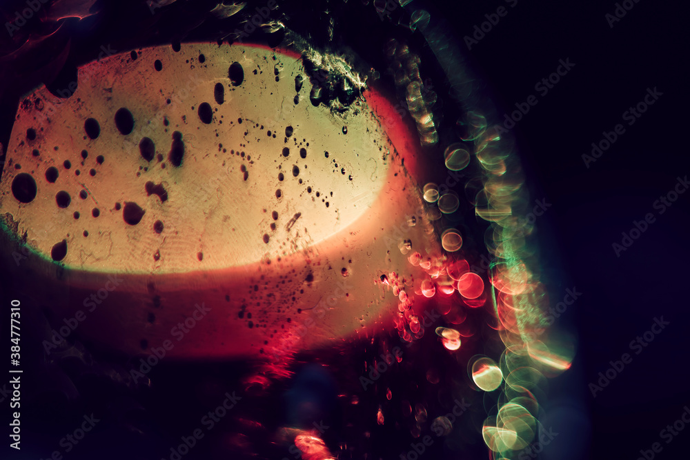 Poster Beautiful RED and Orange colored bokeh on a dark abstract. Beautiful  background pattern for design..