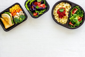 Lunch boxes with meal. Food delivery concept. Overhead view
