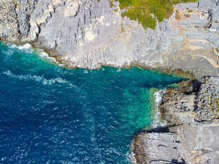 Aerial view of Katafygi rocky plateau beach in Mani, Greece