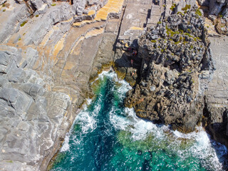 Aerial view of Katafygi rocky plateau beach in Mani, Greece