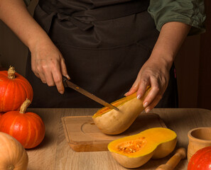 slicing pumpkin, cooking pumpkin, working in the kitchen