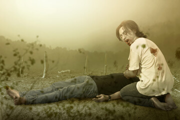 Scary zombie with blood and wound on his body eating a dead man