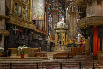 Fototapeta na wymiar The main altar of the Cathedral of Milan - Duomo di Milano in Milan, Italy