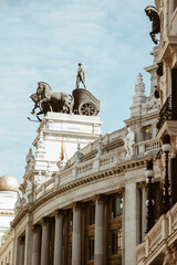 Fototapeta na wymiar Romantic statue in Madrid building