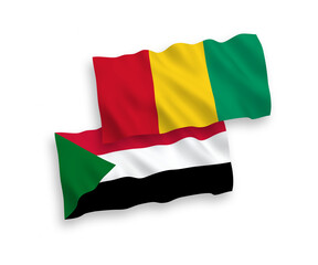 Flags of Guinea and Sudan on a white background