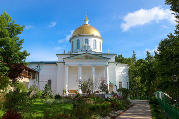 St. Michael's Cathedral in Pskov-Pechory Monastery in Pechory, Pskov region, Russia under blue sky