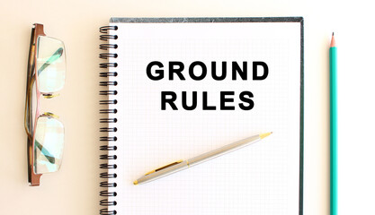 Notepad with text on a white background, near glasses and pencil. Business concept.