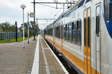 Fototapeta na wymiar Passanger train at a station at Hoek Van Holland Strand before it was connected to the Rotterdam metro network