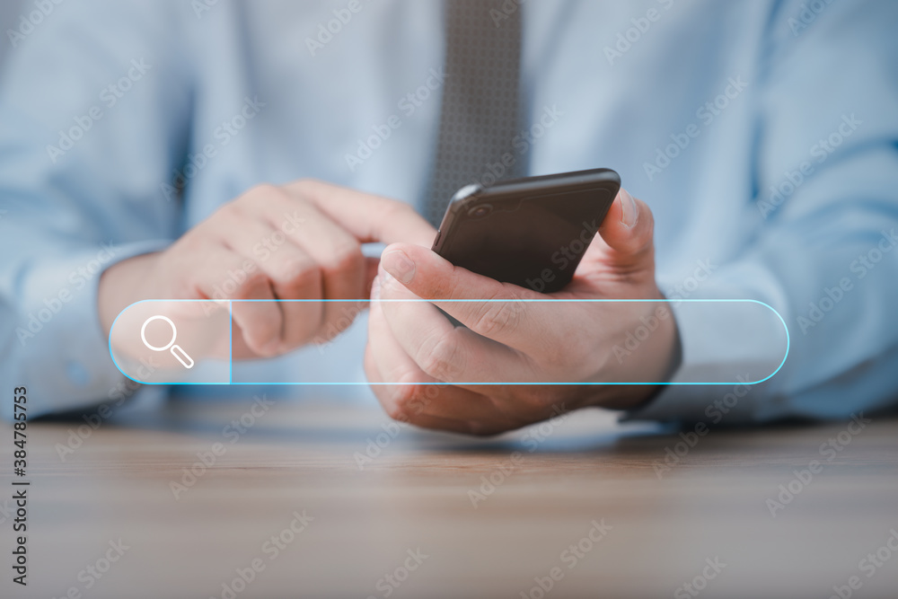 Leinwandbilder Data Search Technology Search Engine Optimization. male hands are using a smart phone to Searching for information.Using Search Console with your website.