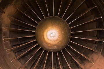 Old jet engine blades coverd with desert dust and rust after long grounding and being abandoned