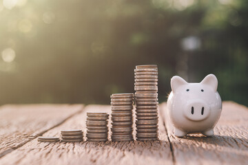 business finance and saving money investment , Money coin stack growing graph with piggy bank...