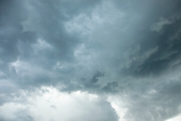 Dark swirling storm clouds above