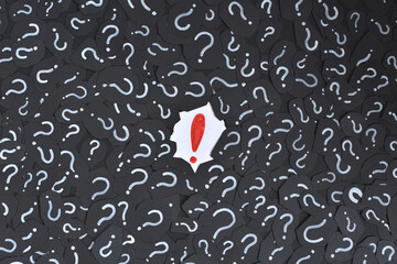 Exclamation mark on a question mark background. Concept of decision, faq, q&a and riddle