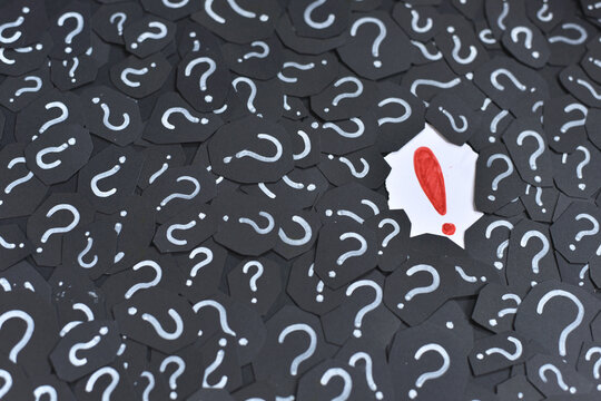 Exclamation mark on a question mark background. Concept of decision, faq, q&a and riddle