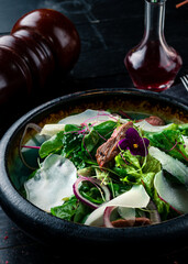 fresh salad with beef and cheese