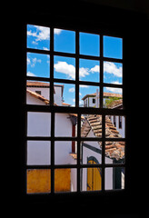 Colonial window with view of Diamantina, historical city in Brazil 