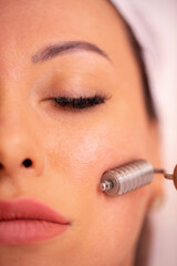 Facial madero massage with a face roller