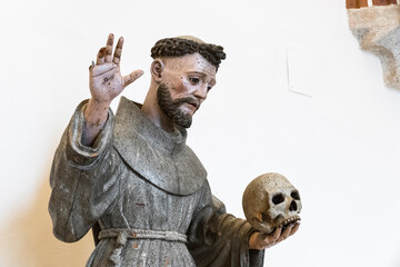 Sculpture of Saint Francis of Assisi - obrazy, fototapety, plakaty
