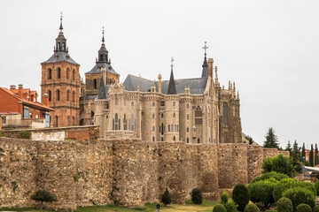 Fototapeta na wymiar Astorga, Spain. Views of the Gaudi Palace, the Cathedral of Saint Mary, and the city walls