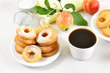 Apple rings on white plate