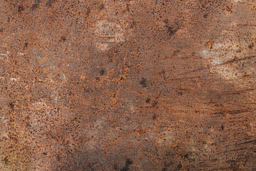 Brown color background of old iron wall.