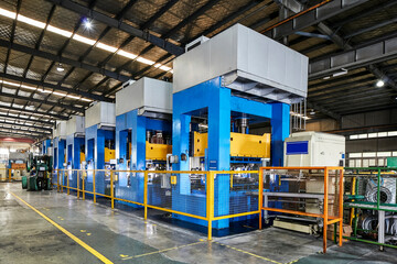Stamping machines in large factories