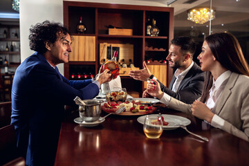 Three business people spending peaceful time together