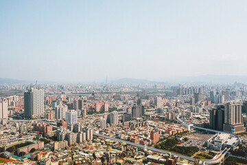 Fototapeta na wymiar New Taipei City,Taiwan - Feb 1, 2020: This is a view of the Banqiao district in New Taipei where many new buildings can be seen, the building in the center is Banqiao station
