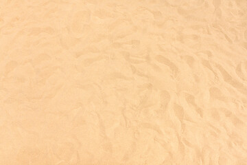 background and texture of sand pattern on a beach in summer