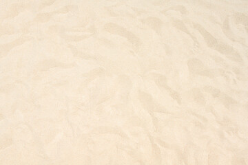 Fototapeta na wymiar background and texture of white sand pattern on a beach in summer