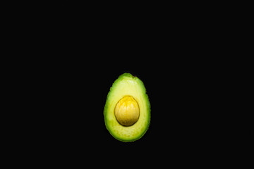 Avocado black background studio shoot