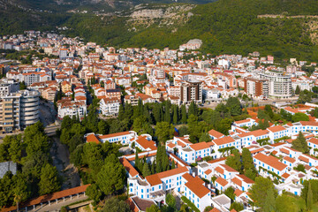 Fototapeta na wymiar Budva. Montenegro. City, port, sea and beach views. View from above.