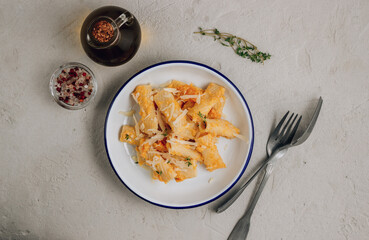 Creamy roasted butternut pumpkin tortiglioni pasta with parmesan cheese and thyme.