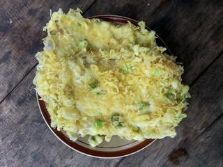 Tempe Mendoan is a traditional indonesian culinary food kind of tempeh cooking that is made from thin tempeh, fried with flour so as to taste deliciously