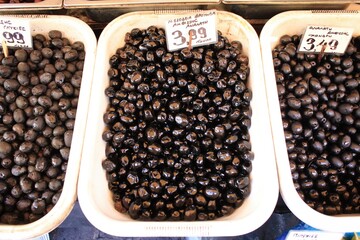 Stall with Amfissa olives at street market in Athens, Greece.