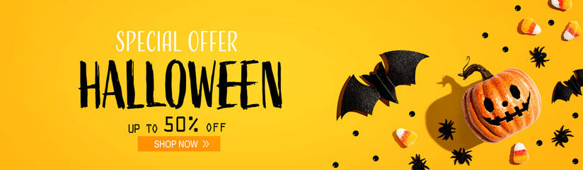 Halloween sale banner with pumpkins ghost and Halloween decorations - flat lay