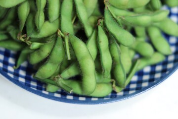 Boiled Edamame, green soybeans on a plate