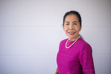 Portrait of a smiling asian senior woman