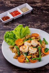 Stir-fried rice noodles with soy sauce and shrimp