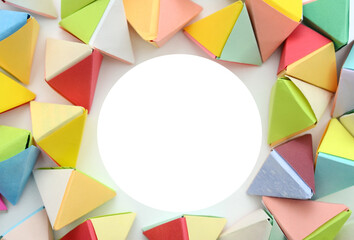 Naklejka premium Abstract origami tetrahedrons in circle sign