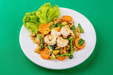 Stir-fried rice noodles with soy sauce and shrimp