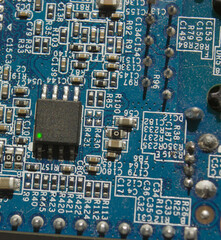 microchip with electronic components on pcb