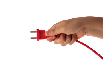 Hand hold electric power plug isolated on white background. Red cable, electronics.