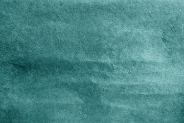 Green crumpled background paper texture
