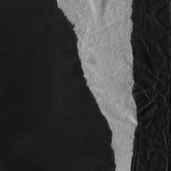 Black torn paper collage close-up. Texture made from various paper and cardboard parts. Damaged old paper background. Vintage blank wallpaper. Material design backdrop.