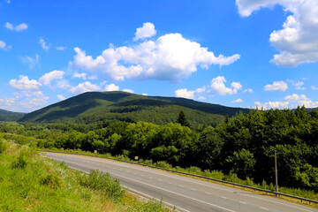 Picturesque Carpathian mountains on a background of blue beautiful sky