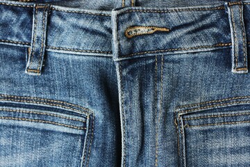 Beautiful blue jeans background close up view