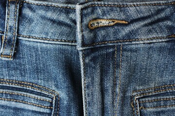 Beautiful blue jeans background close up view