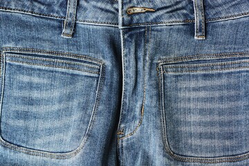 Fototapeta premium Beautiful blue jeans background close up view